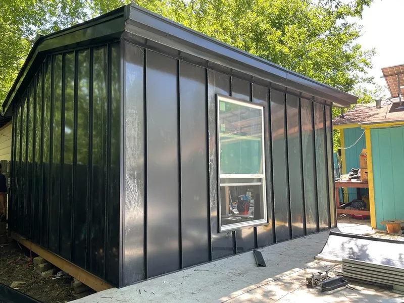 Black standing seam metal wall panels for Metal Roof Installation in Wallingford