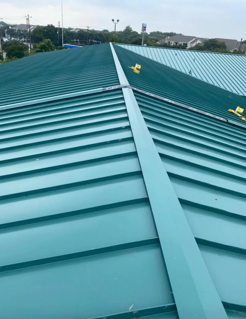 Green commercial metal roof ridge and valley for Metal Roof Repair in Wallingford